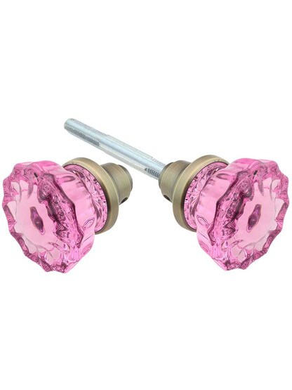 Pair of Pink Fluted Crystal Glass Door Knobs in Antique Brass.